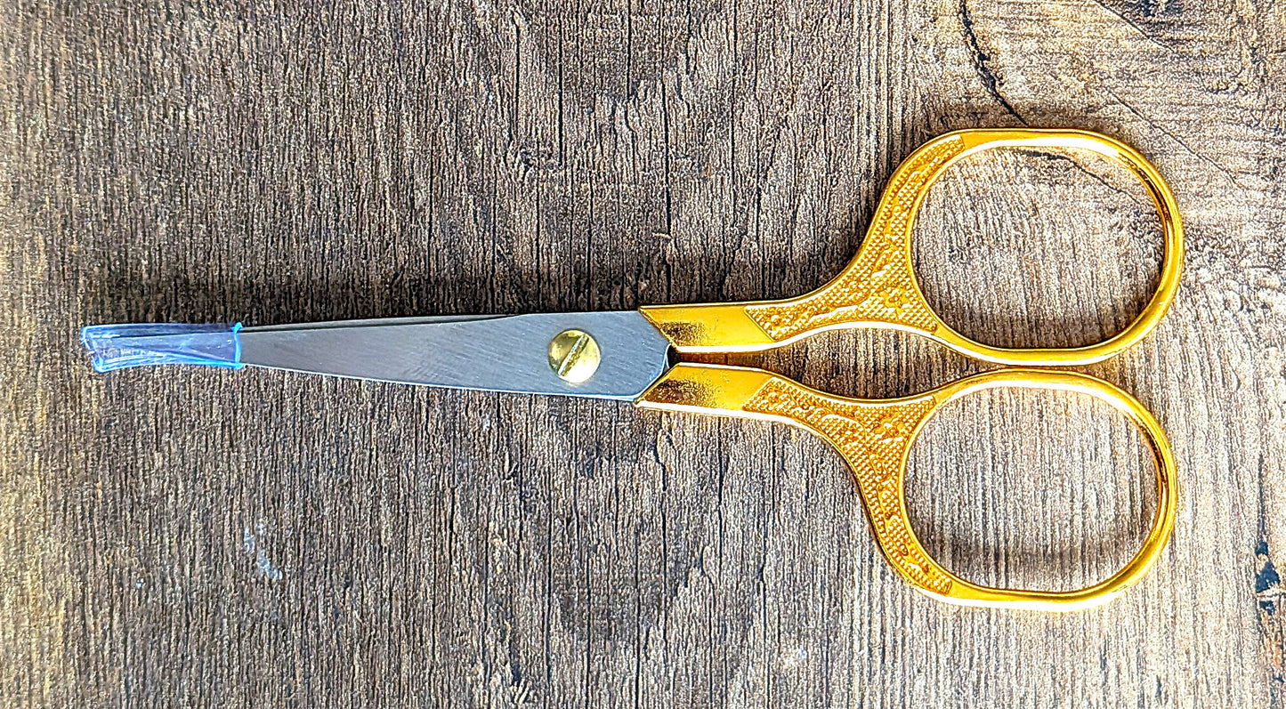 Grotere borduurschaar goud